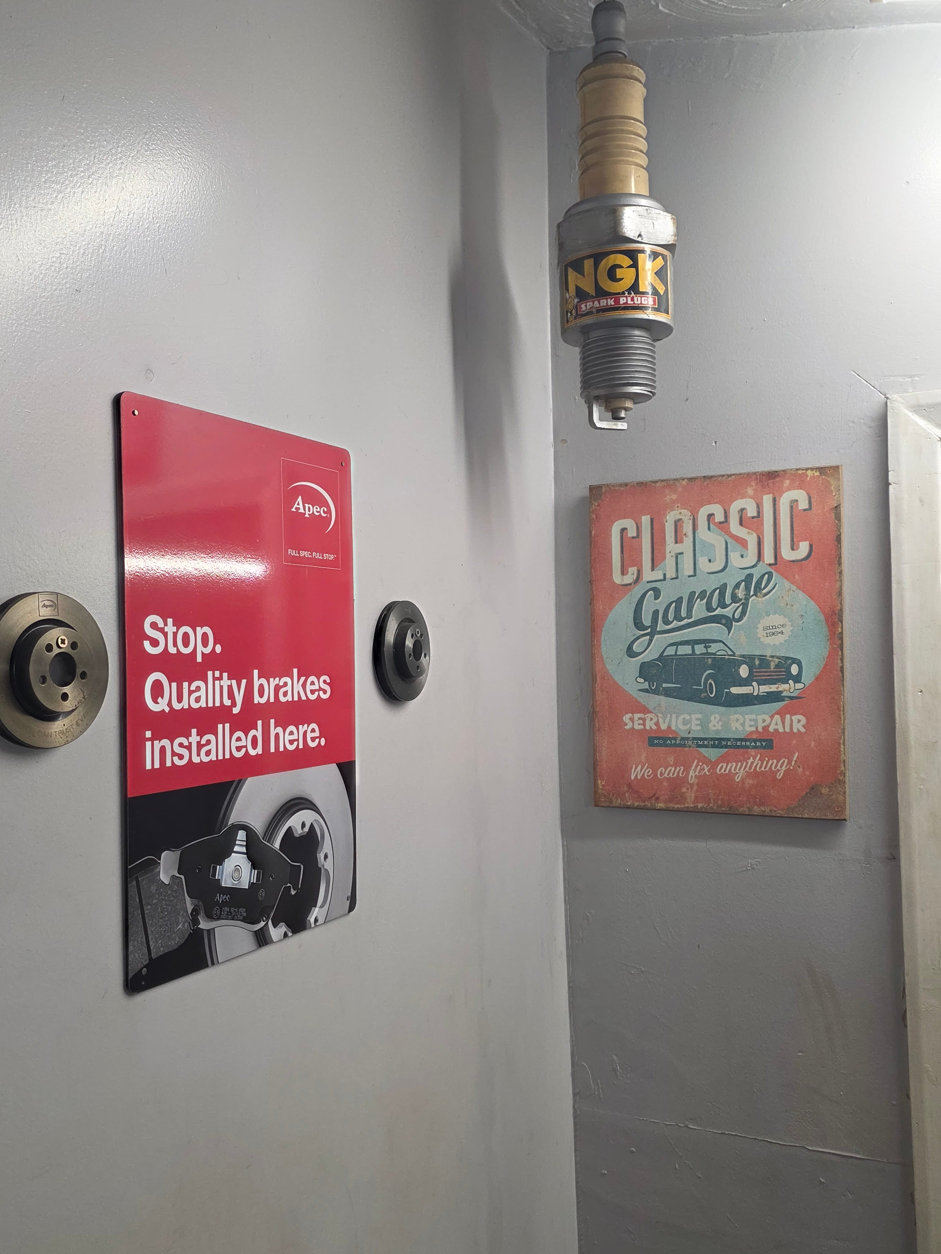 Langdon Motors reception entrance with awards and heritage signs