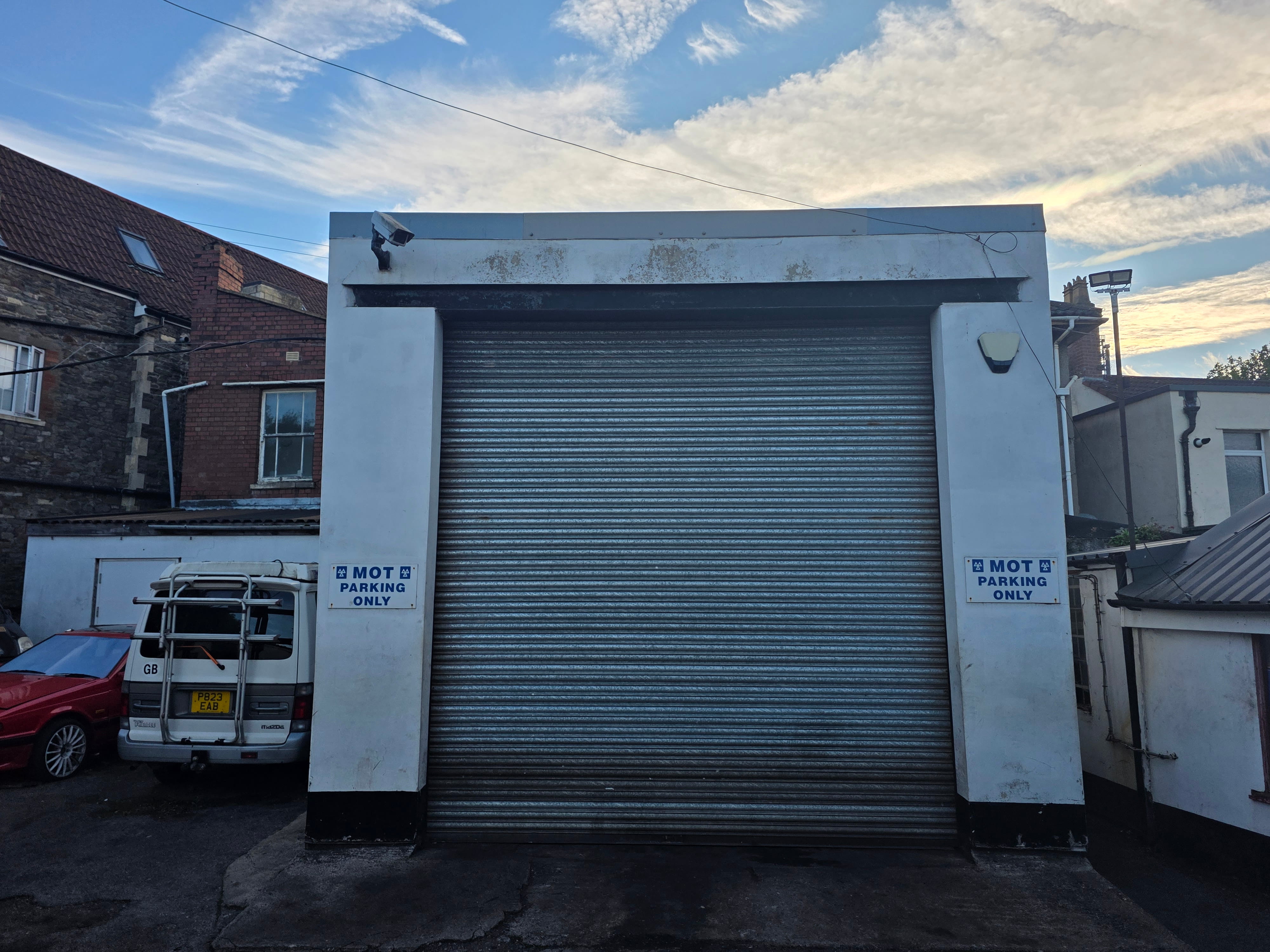 Service and MOT bay shutter door entrance