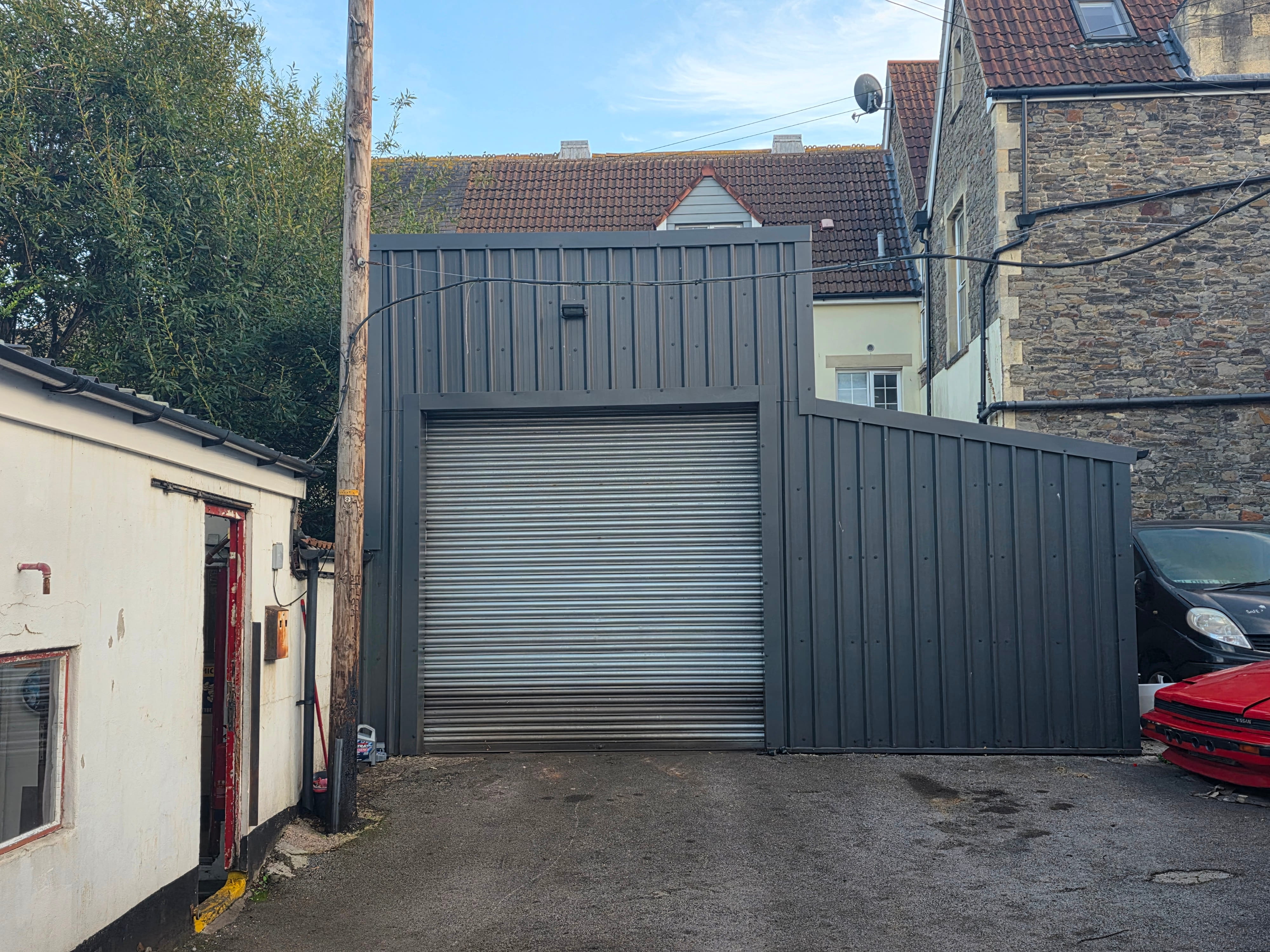 Langdon Motors workshop exterior and yard