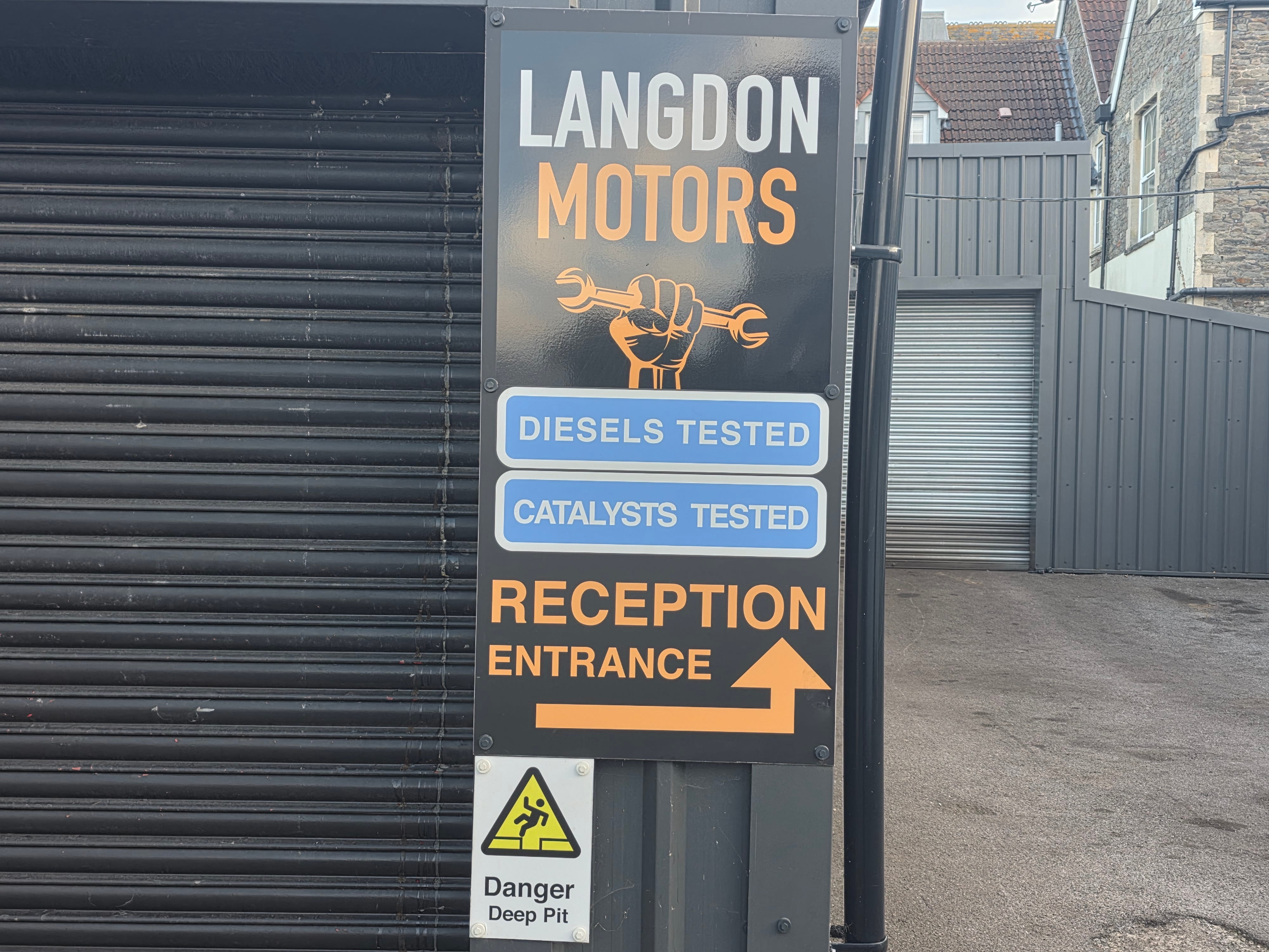 Langdon Motors reception entrance signage on School Road