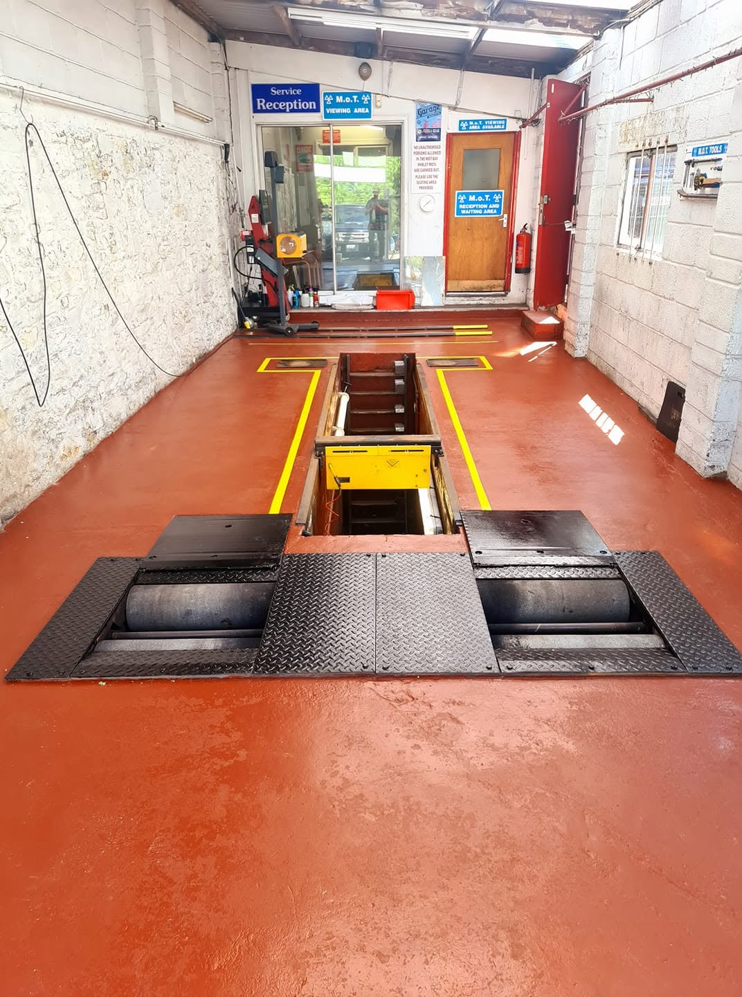DVSA approved MOT inspection bay with red floor
